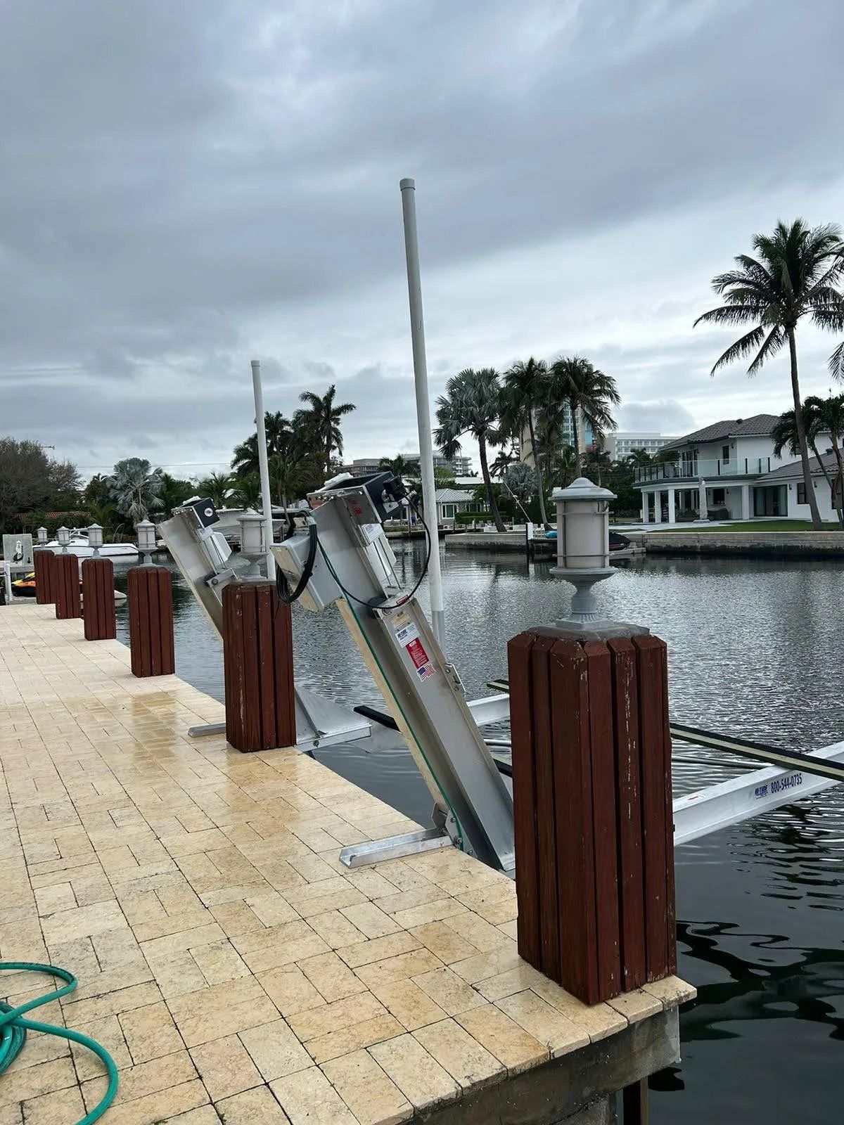 Boat lift installed for a waterfront homeowner