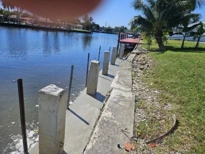 Combined seawall and dock construction project