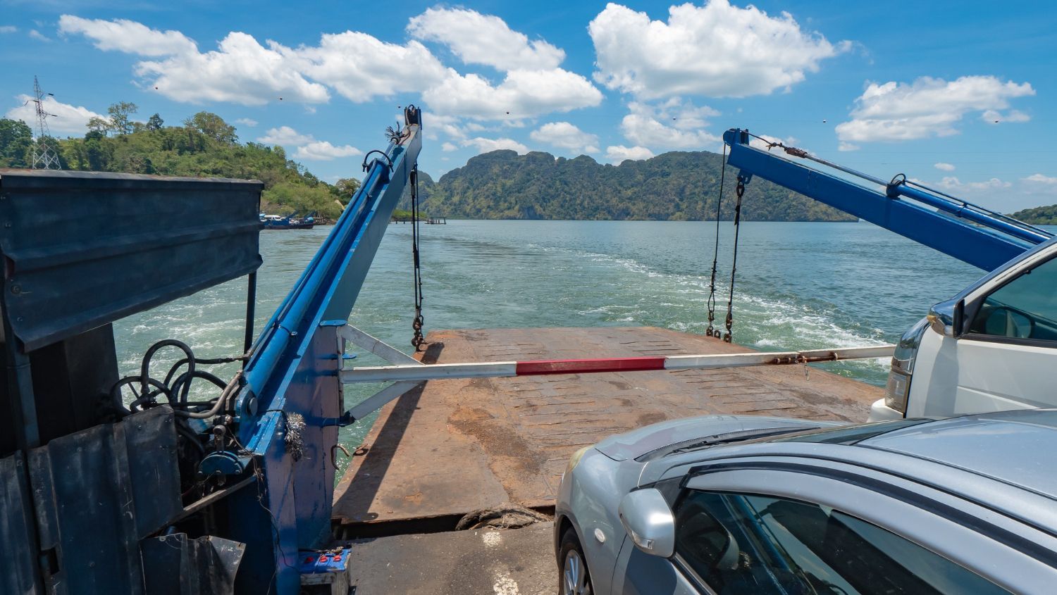 Boat raised on a newly installed boat lift at a South Florida dock